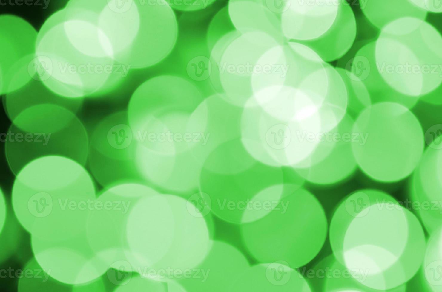 groen abstract Kerstmis wazig lichtgevend achtergrond. onscherp artistiek bokeh lichten beeld foto