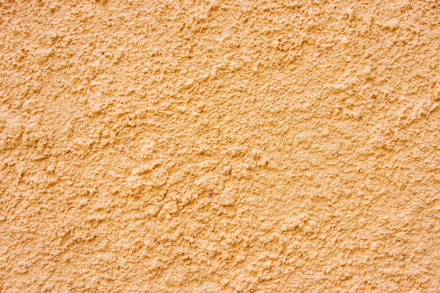 oranje gepleisterde muur foto
