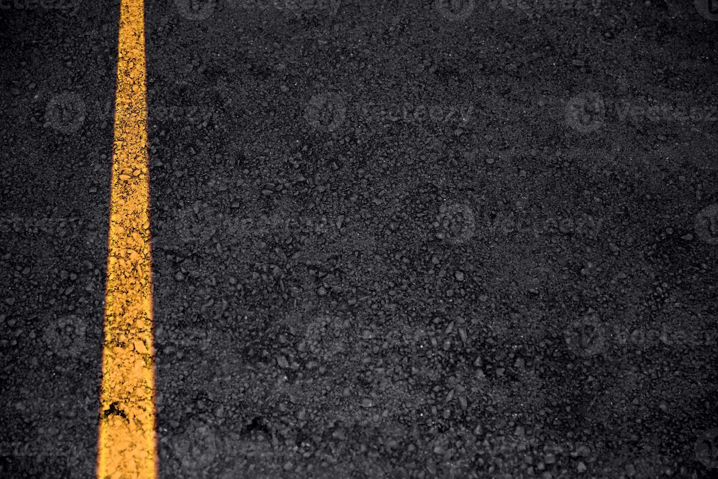 weg asfalt structuur met verkeer lijn voor vervoer achtergrond met ruimte voor tekst foto