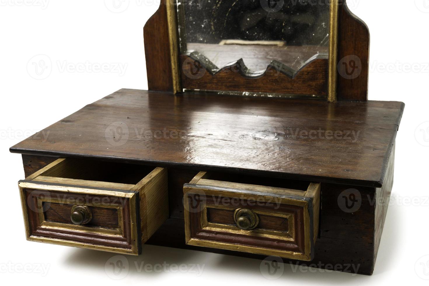 oud meubelstuk met lades en spiegel foto