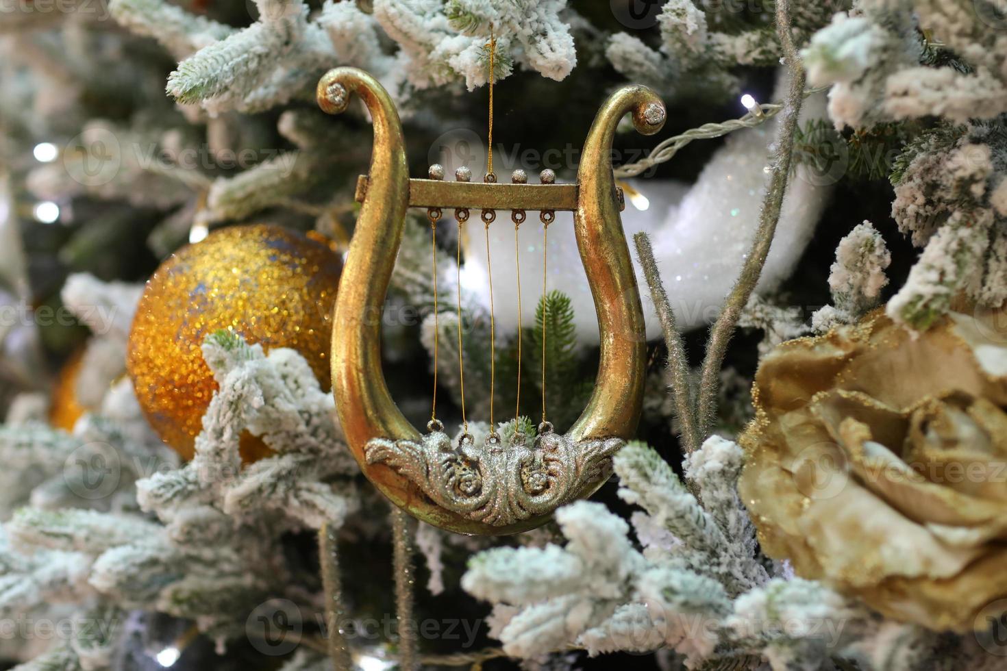 Kerstmis speelgoed- musical instrument harp. Kerstmis decoraties. foto