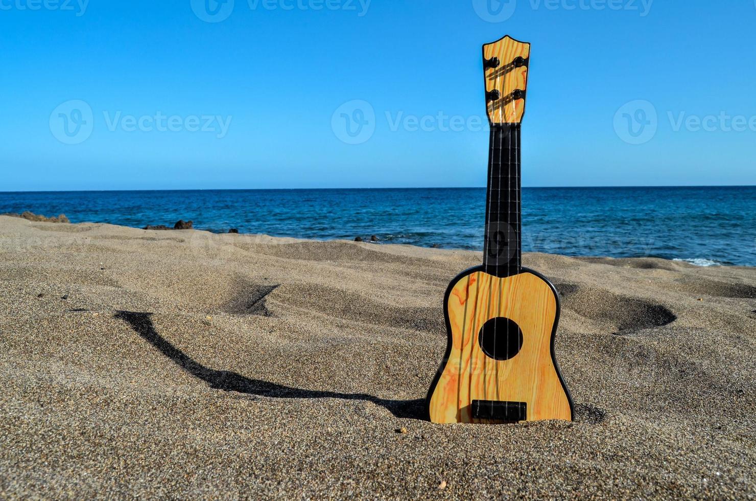 ukelele op de grond foto