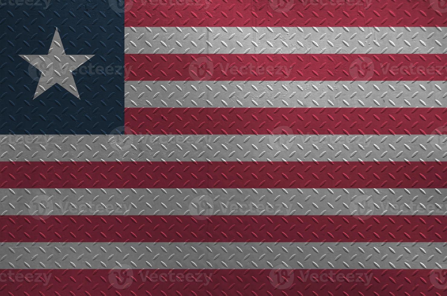 Liberia vlag afgebeeld in verf kleuren Aan oud geborsteld metaal bord of muur detailopname. getextureerde banier Aan ruw achtergrond foto