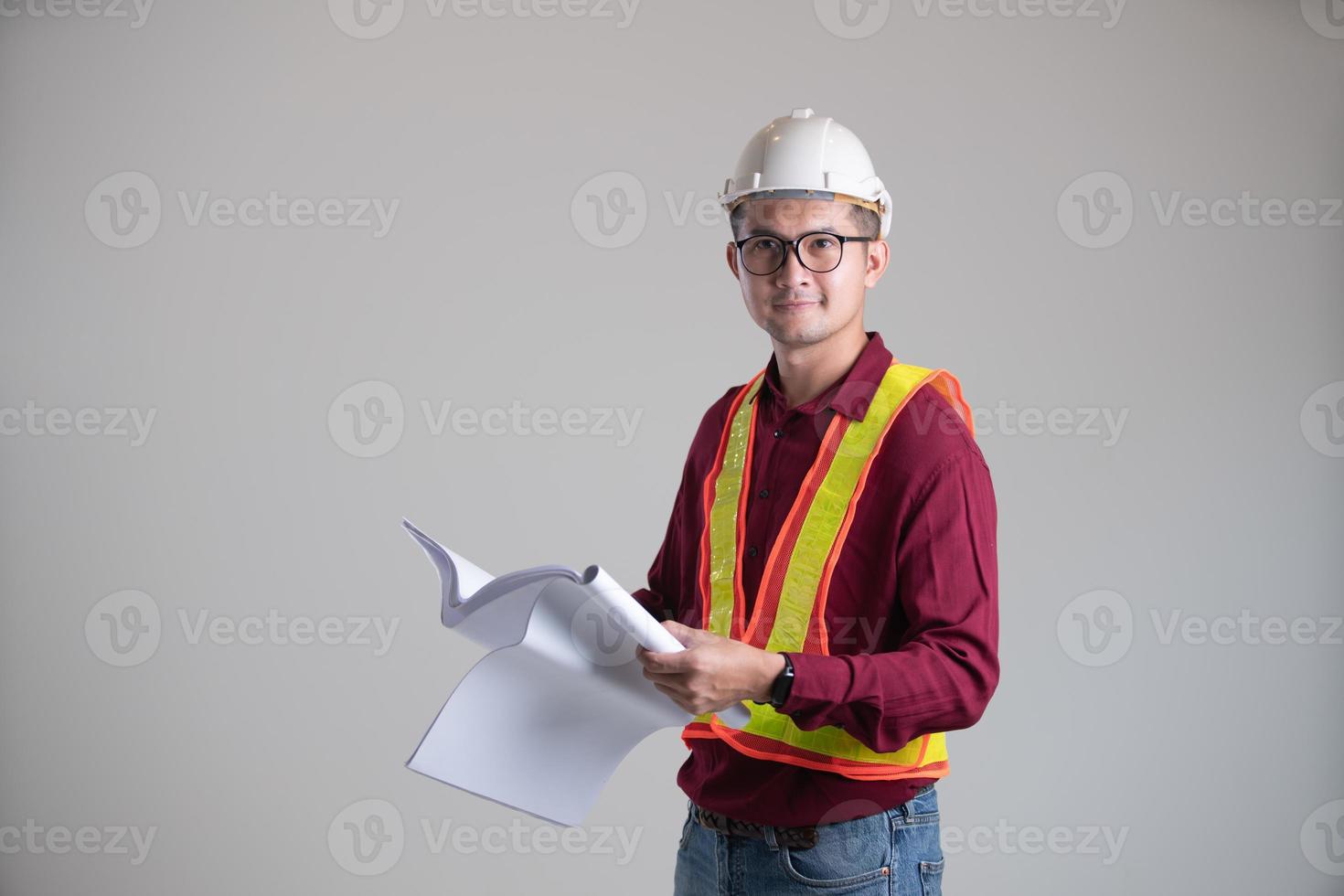 portret bouwkunde Holding de blauwdruk foto