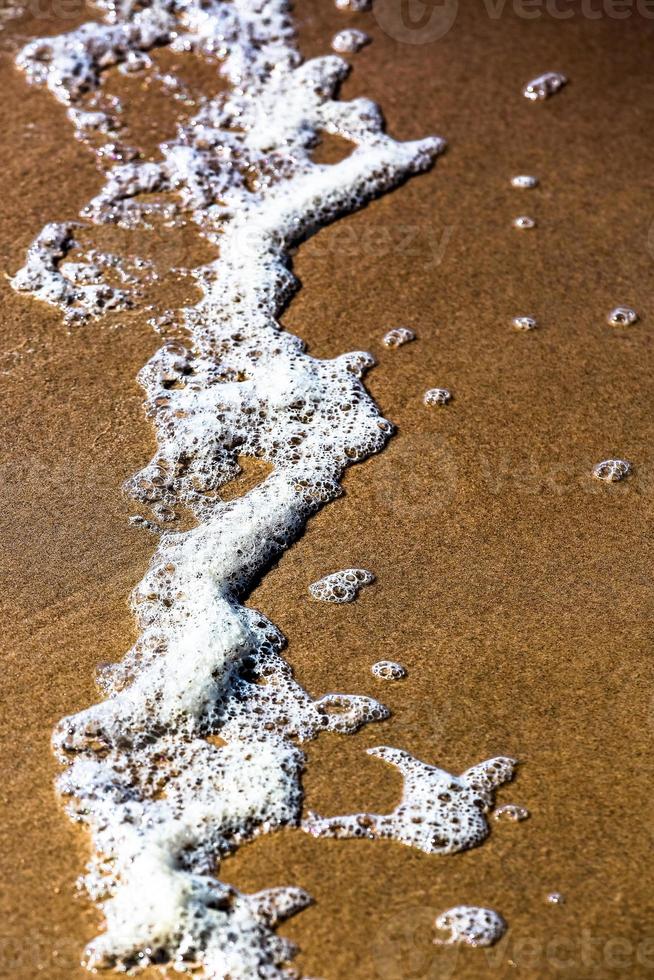 patronen in de strand zand foto