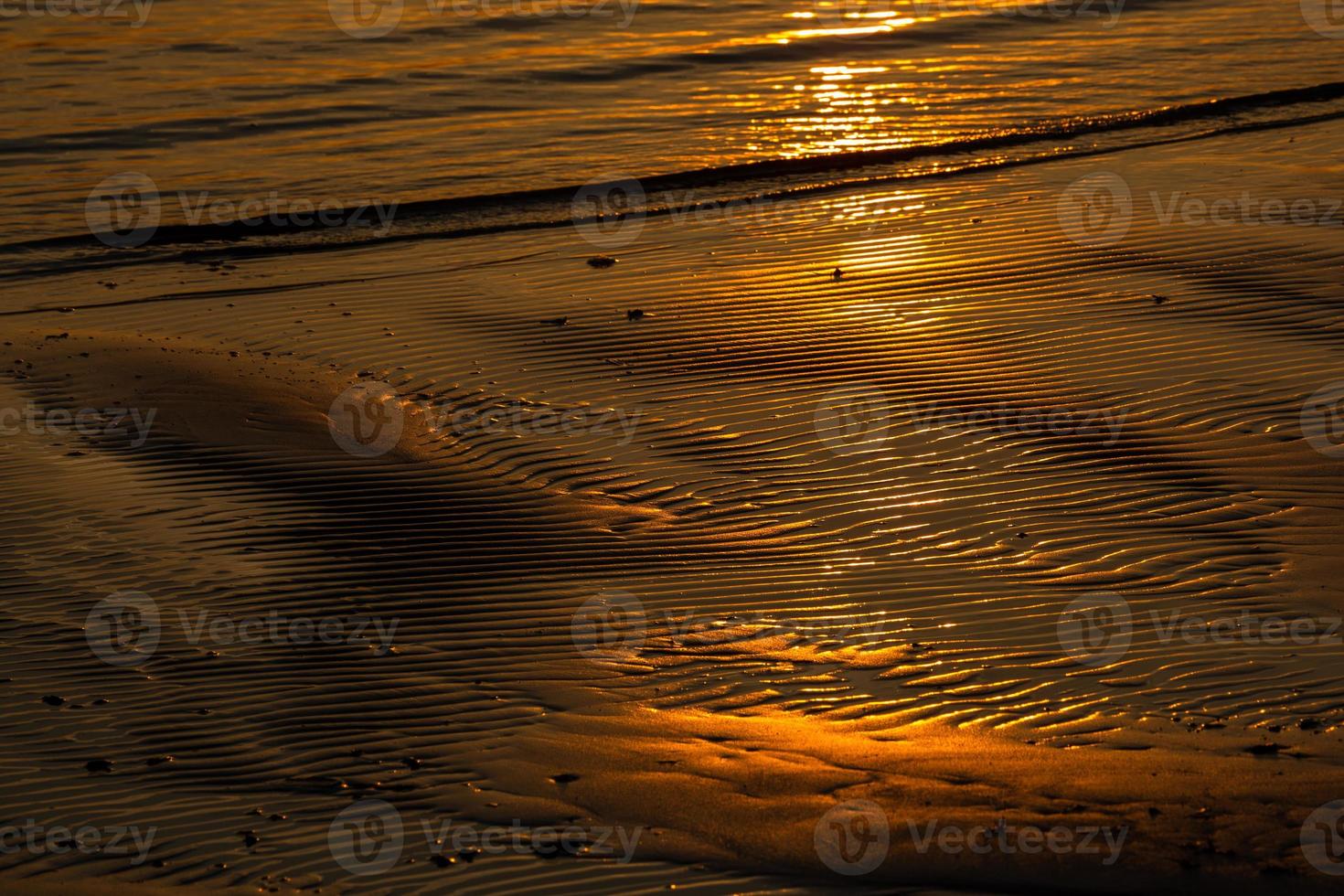 patronen in de strand zand foto