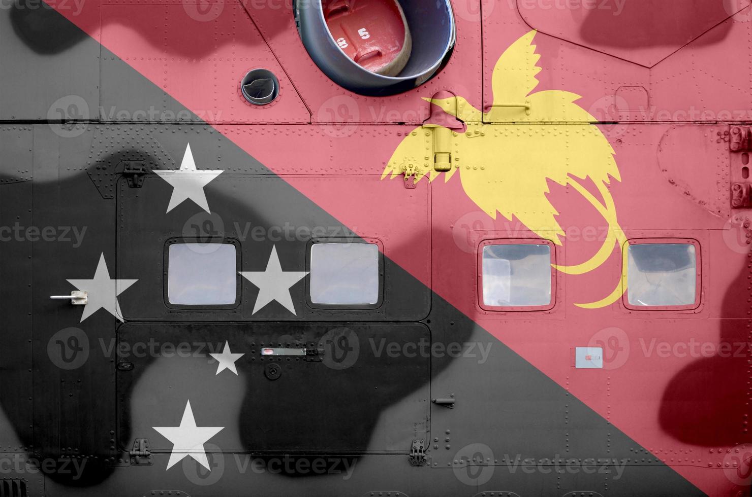 Papoea nieuw Guinea vlag afgebeeld Aan kant een deel van leger gepantserd helikopter detailopname. leger krachten vliegtuig conceptuele achtergrond foto