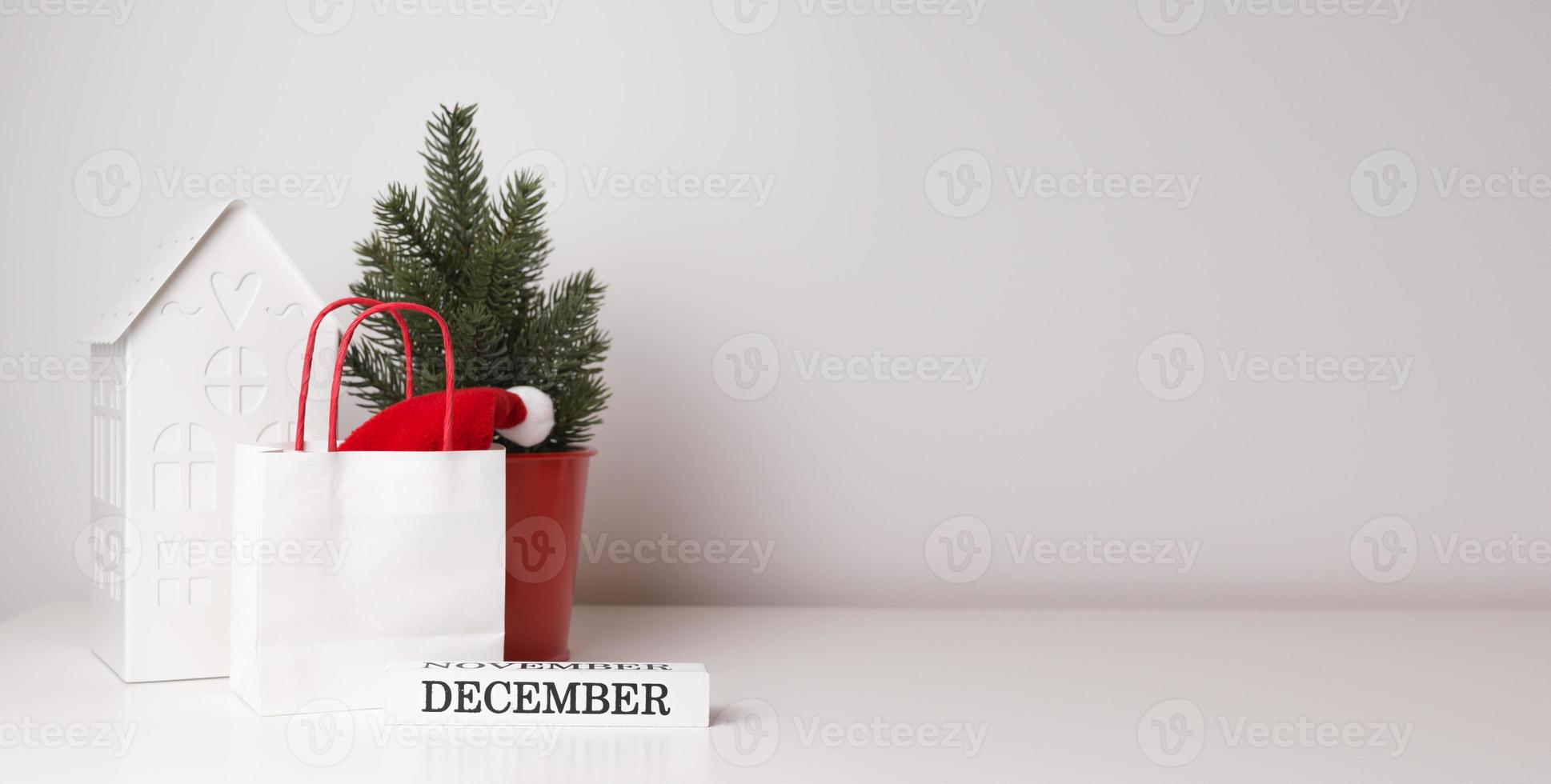 Kerstmis concept banier met plaats voor tekst. winter decoraties met december blok. foto