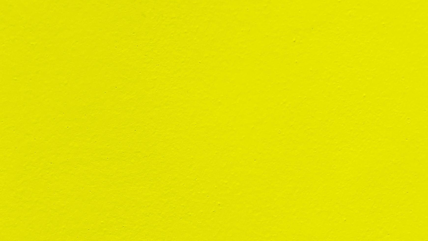 naadloos structuur van geel cement muur een ruw oppervlak, met ruimte voor tekst, voor een achtergrond. foto