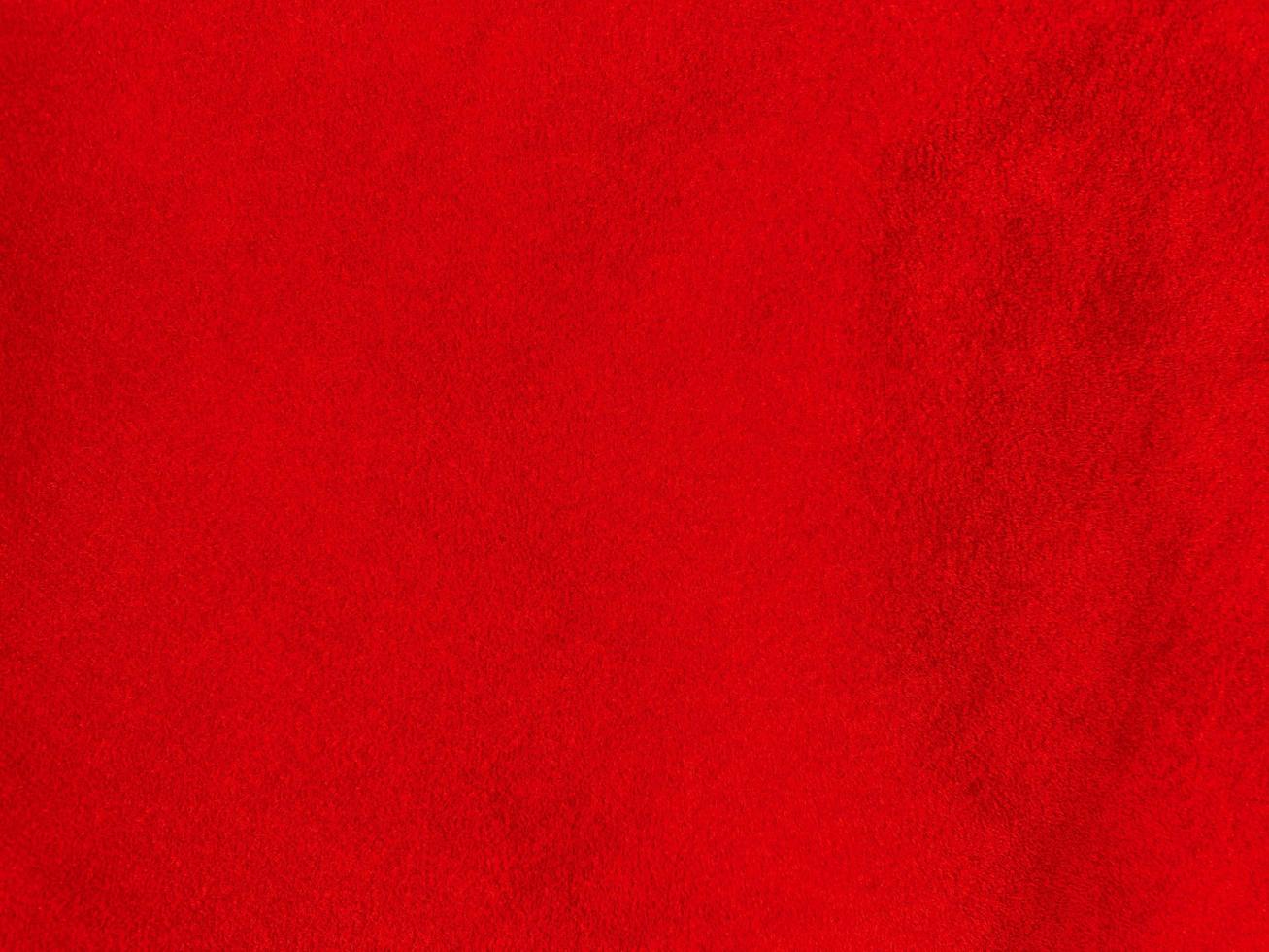 rood fluweel kleding stof structuur gebruikt net zo achtergrond. leeg rood kleding stof achtergrond van zacht en glad textiel materiaal. Daar is ruimte voor tekst. foto
