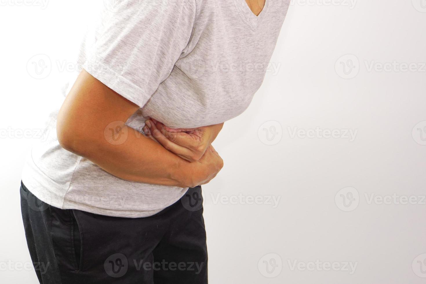 Aziatisch vrouw lijden van maagpijn. chronisch gastritis, menstruatie en Gezondheid concept. foto