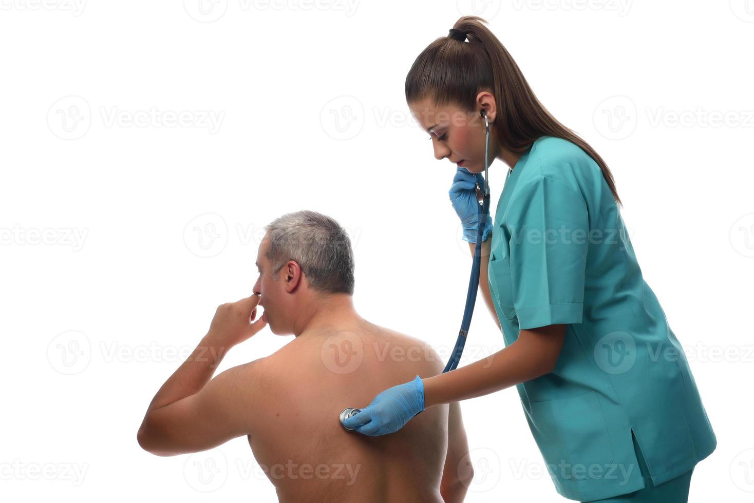 vrouw dokter controle Aan geduldig. medisch concept. foto