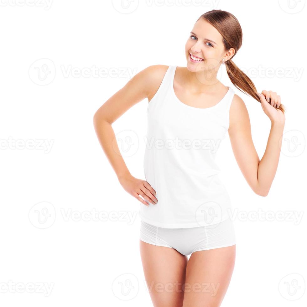 gelukkig vrouw in ondergoed spelen met haar- foto