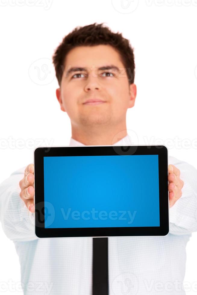 zakenman Holding een tablet apparaat met kopiëren ruimte foto