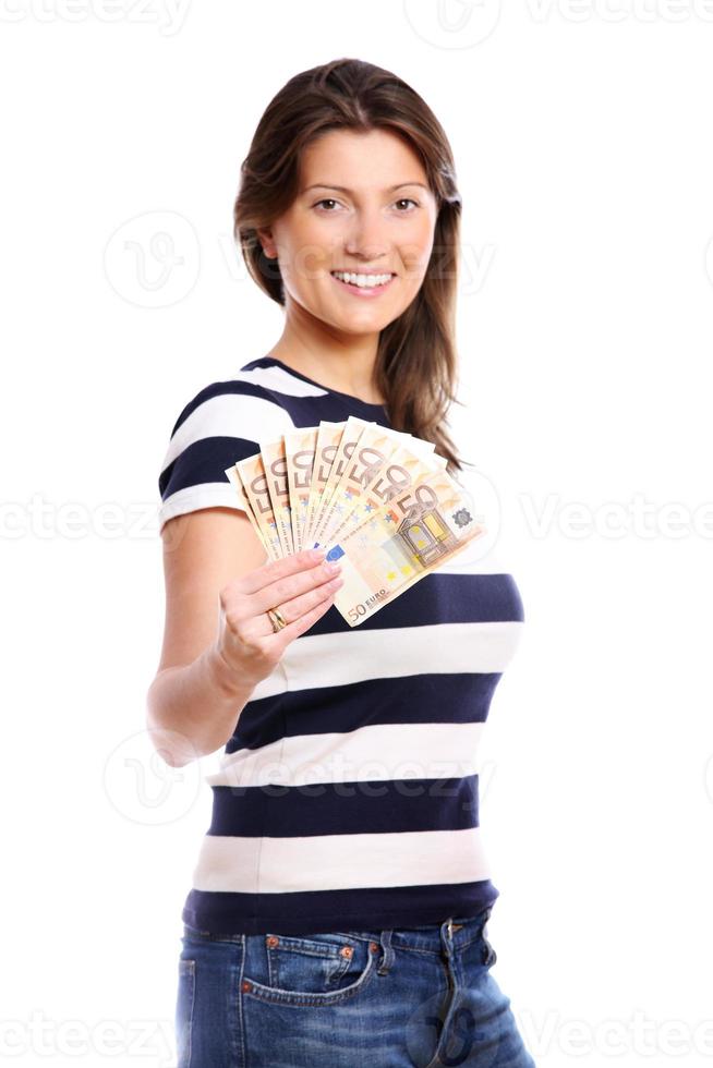 vrouw met een ventilator van geld foto