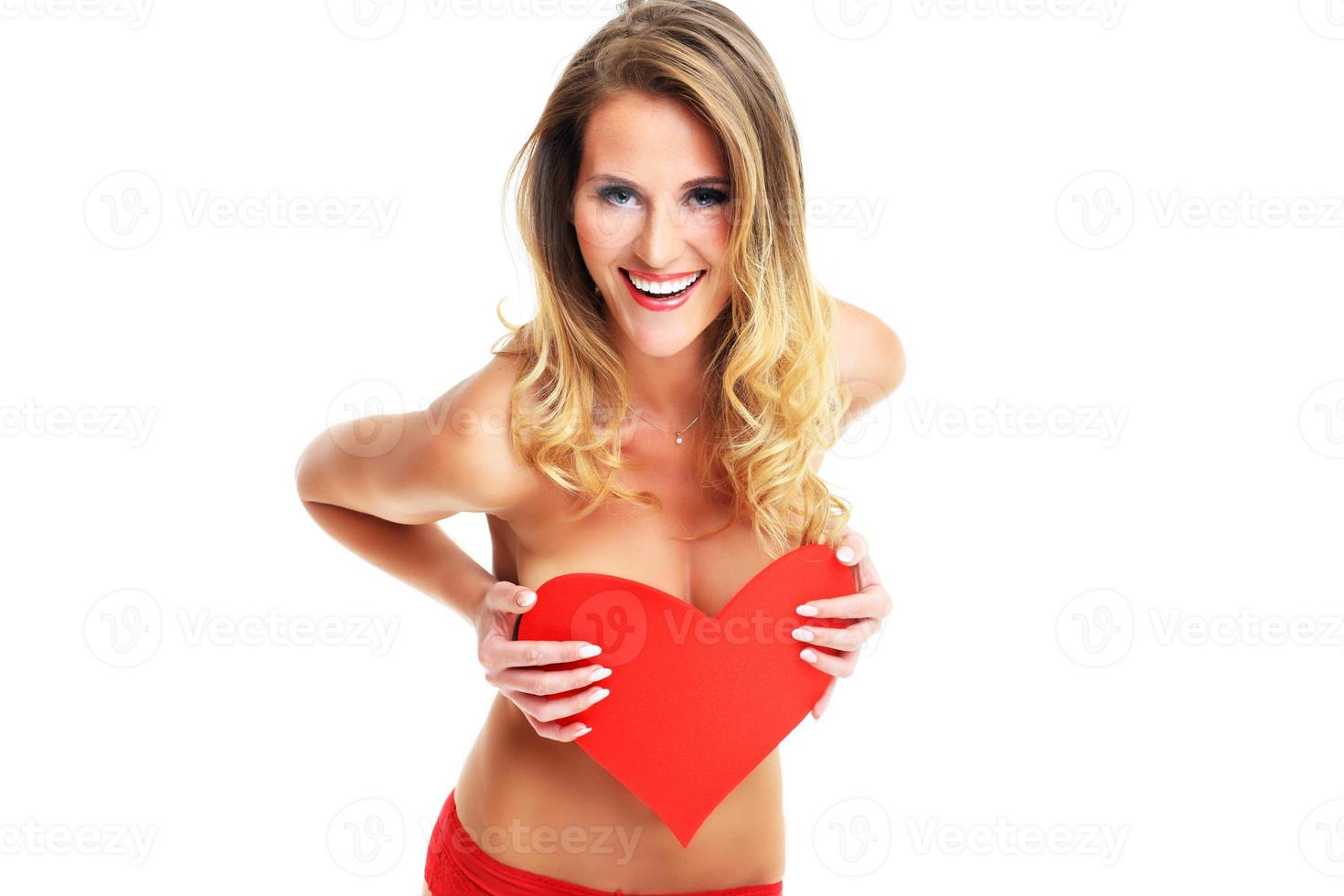 sexy Valentijn vrouw Holding een hart foto