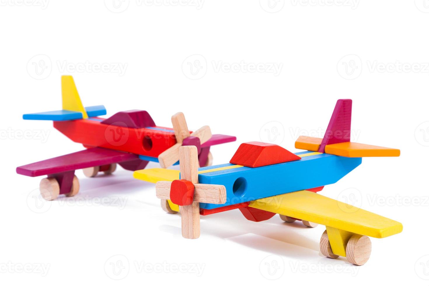 speelgoed- hout retro vliegtuigen Aan een wit achtergrond geïsoleerd foto
