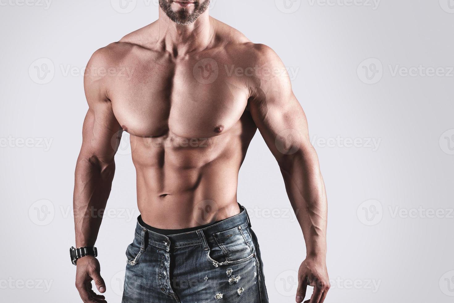 gespierd Mens bodybuilder vervelend jeans foto