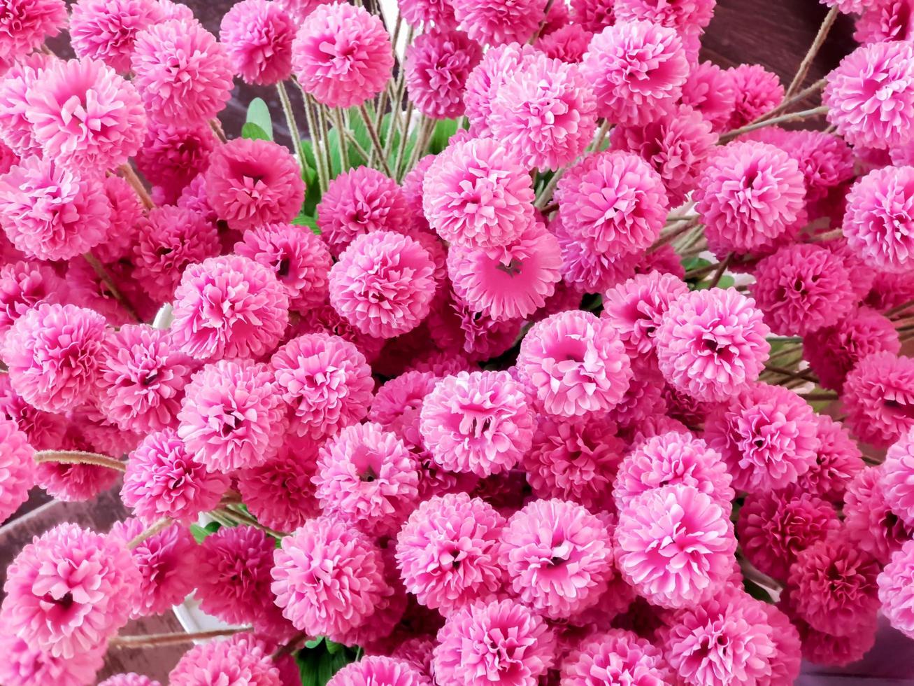 top visie kleding stof roze bloemen fit naar scherm achtergrond en behang. foto