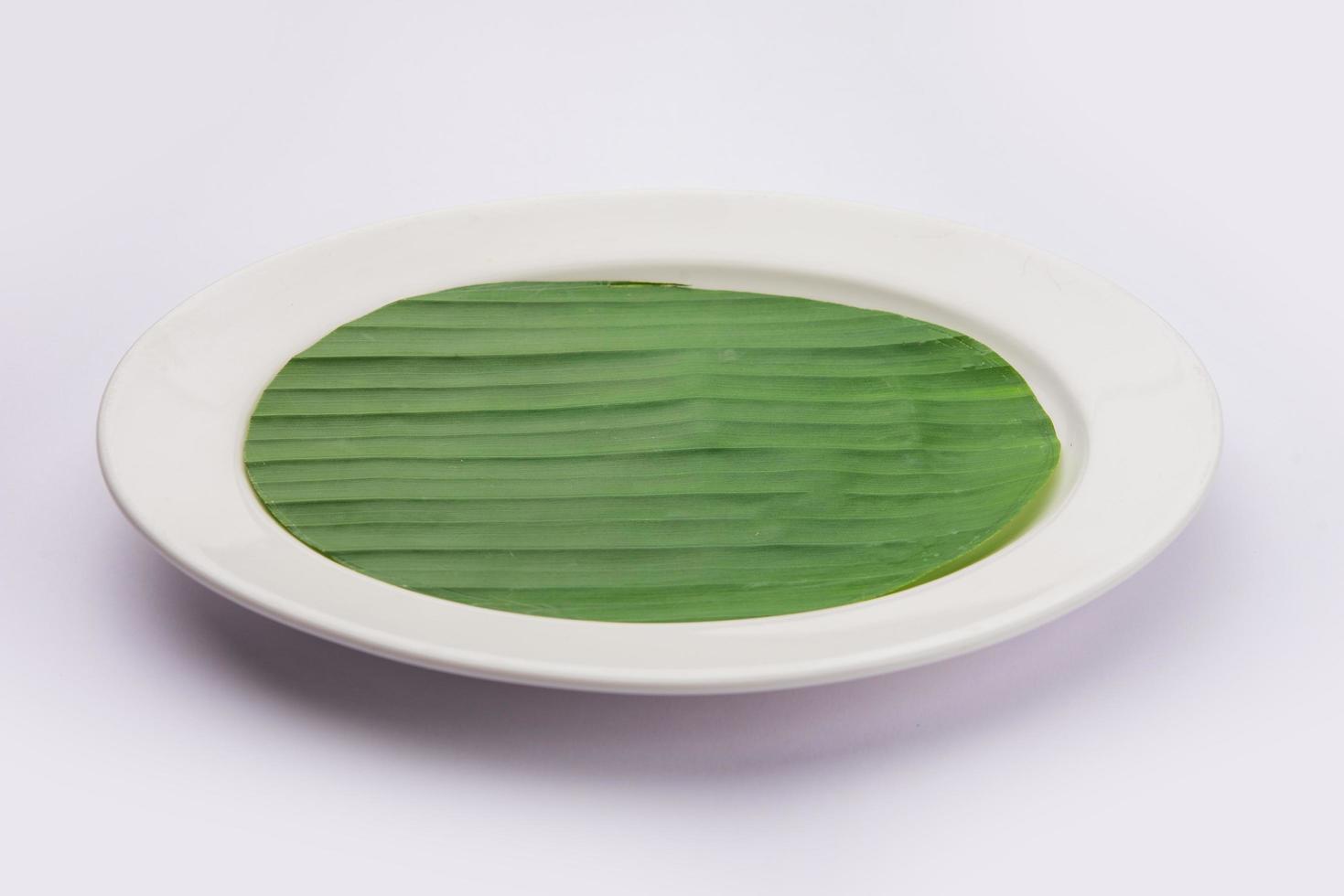 banaan blad Aan blanco bord voor Bewerk voedsel of onderwerpen Aan foto