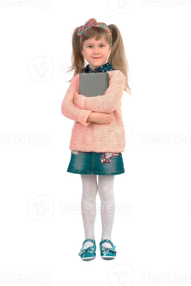 klein meisje met een boek foto