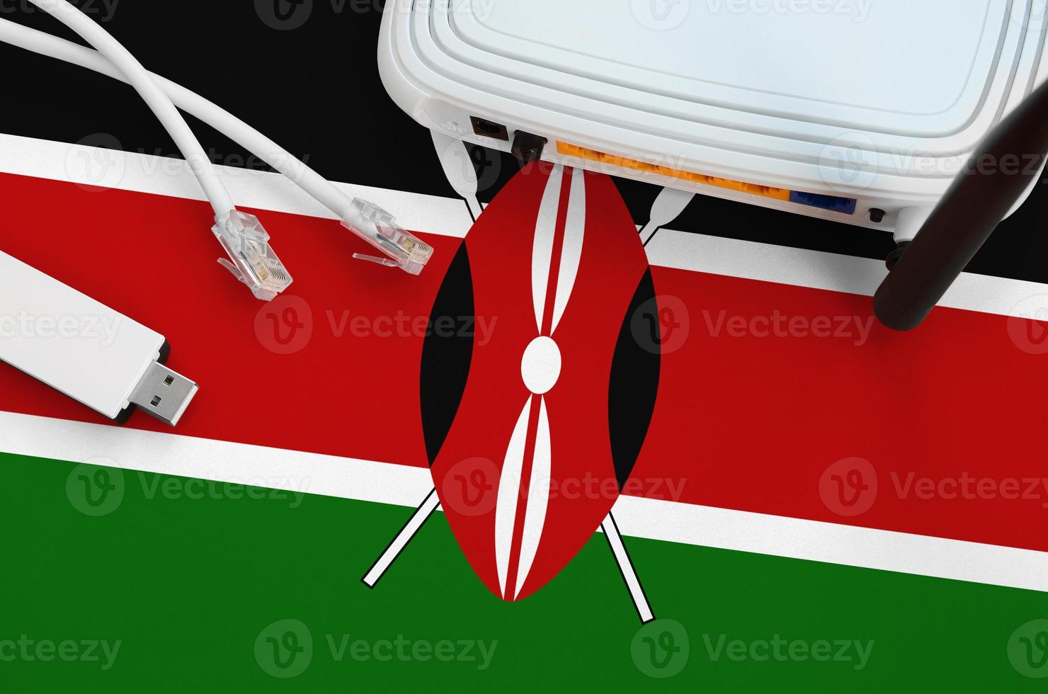Kenia vlag afgebeeld Aan tafel met internet rj45 kabel, draadloze USB Wifi adapter en router. internet verbinding concept foto