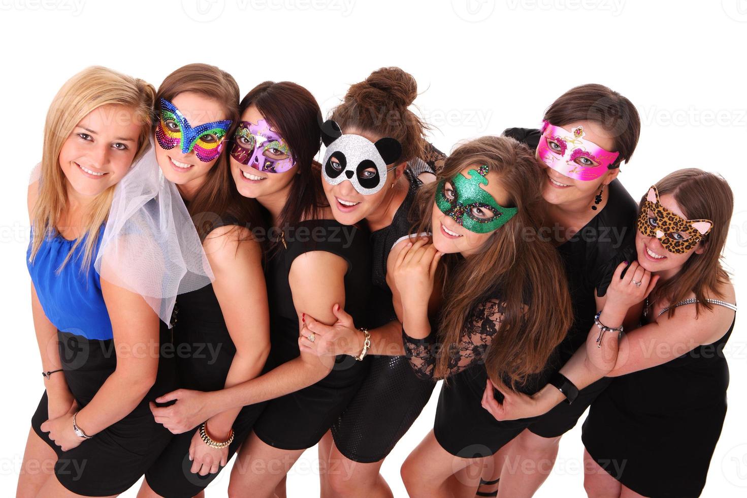 meisjes feesten met maskers foto