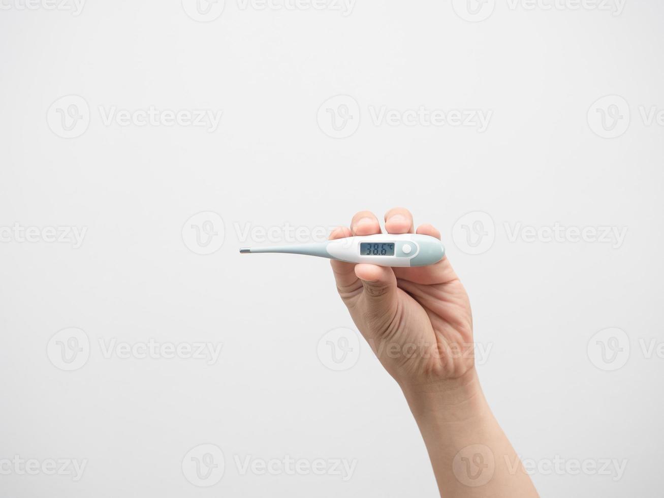 Mens hand- Holding thermometer geïsoleerd wit achtergrond foto