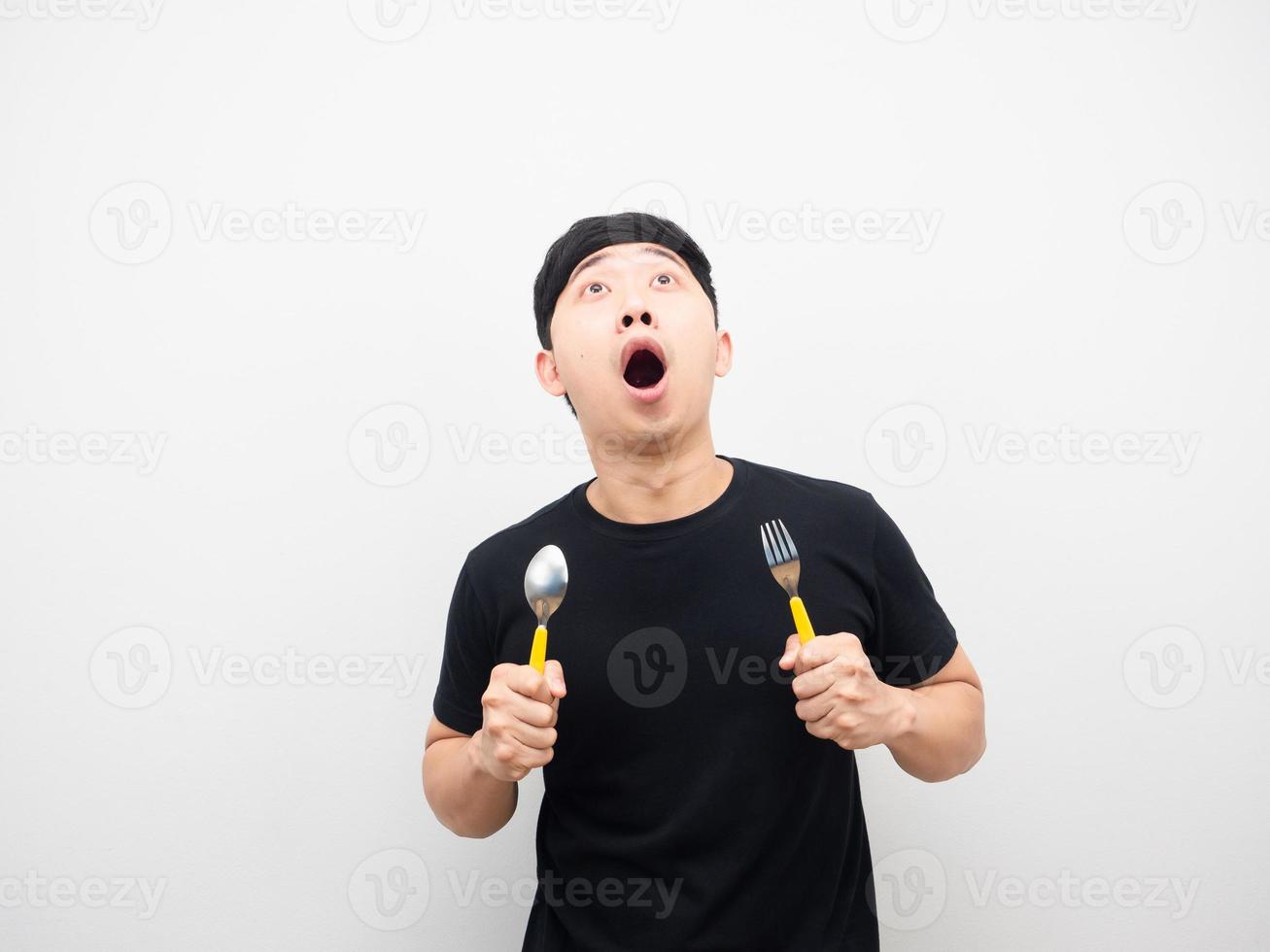 Aziatisch Mens Holding bestek gevoel opgewonden op zoek bovenstaand kopiëren ruimte foto