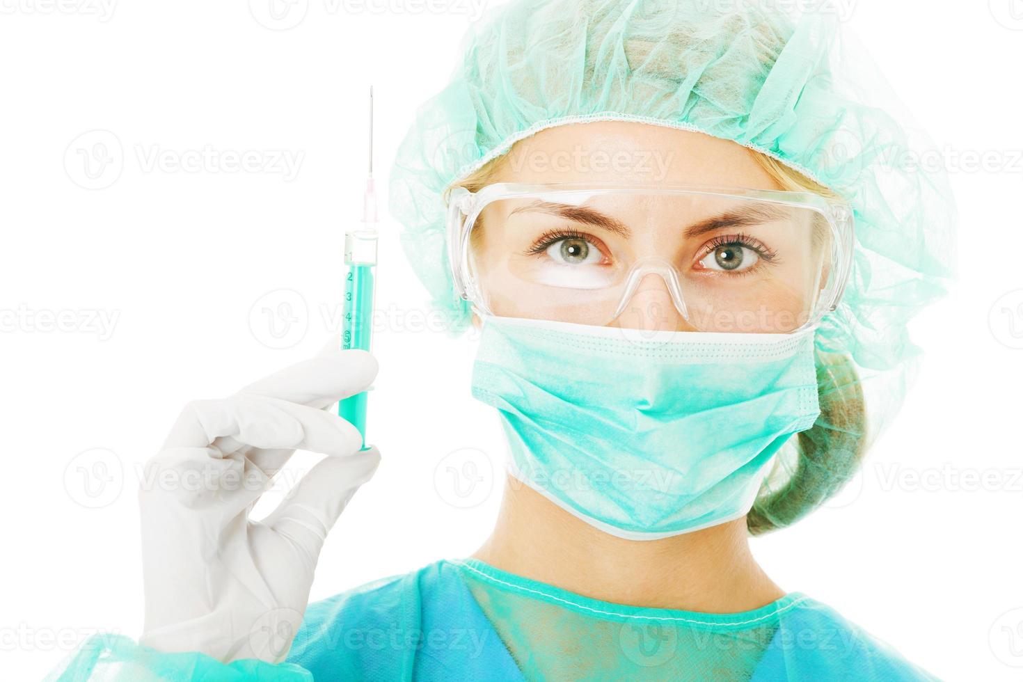 vrouw met injectiespuit foto