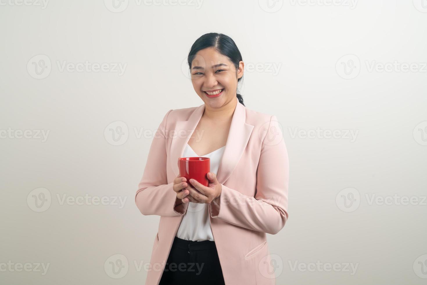 Aziatische vrouw met hand met koffiekopje foto