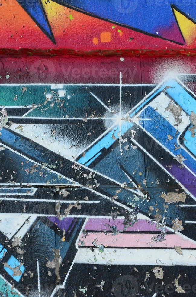 fragment van graffiti tekeningen. de oud muur versierd met verf vlekken in de stijl van straat kunst cultuur. veelkleurig achtergrond structuur foto