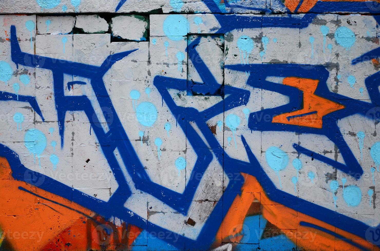 een fragment van graffiti tekening gebruik makend van contouren, toegepast naar de muur met de helpen van blikjes met aërosol verven over- de gekleurde vulling gebieden. achtergrond structuur van straat kunst en vandalisme foto