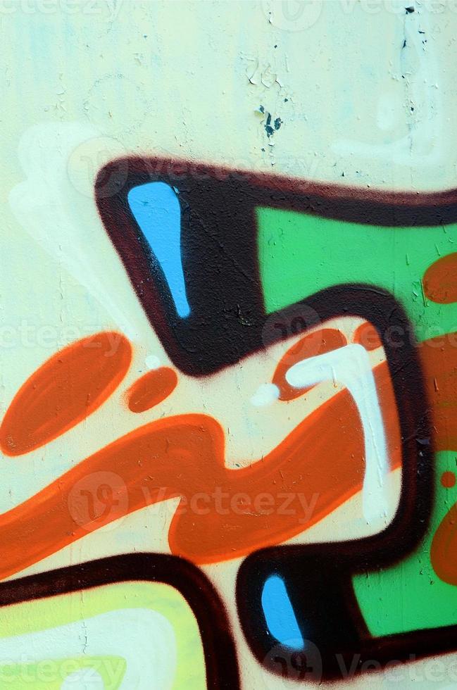 straat kunst. abstract achtergrond beeld van een fragment van een gekleurde graffiti schilderij in khaki groen en oranje tonen foto