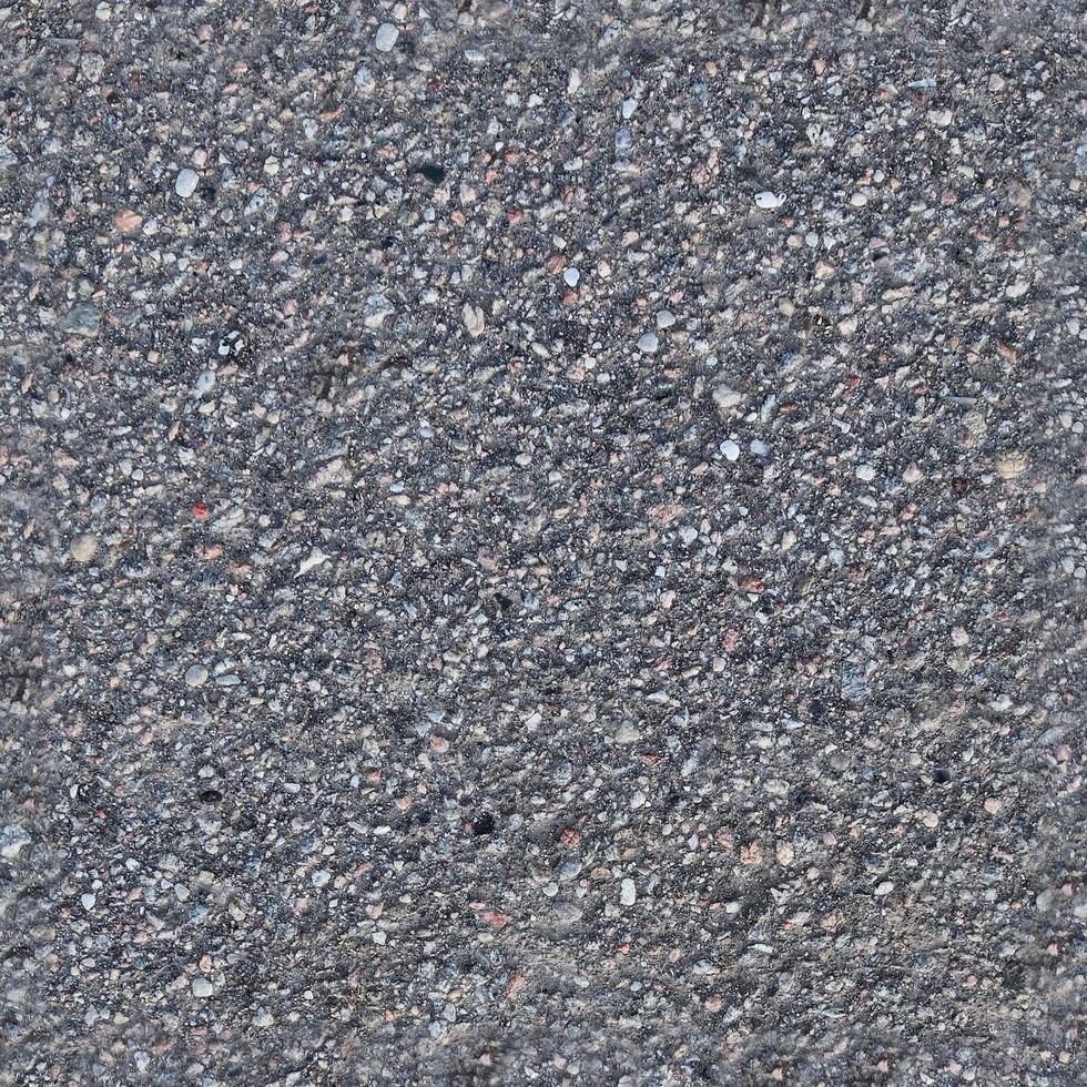 gedetailleerd naadloos structuur van asfalt Aan een straat in hoog resolutie foto