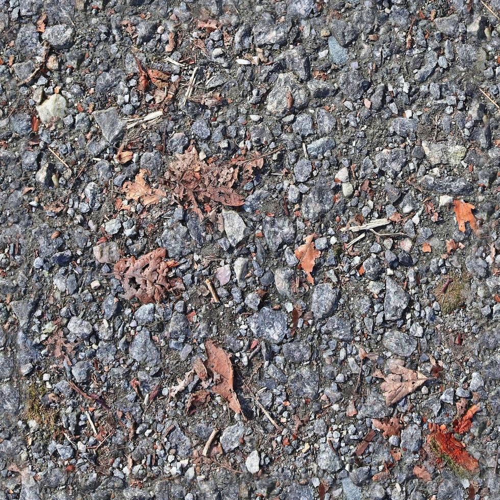 gedetailleerd naadloos structuur van asfalt Aan een straat in hoog resolutie foto
