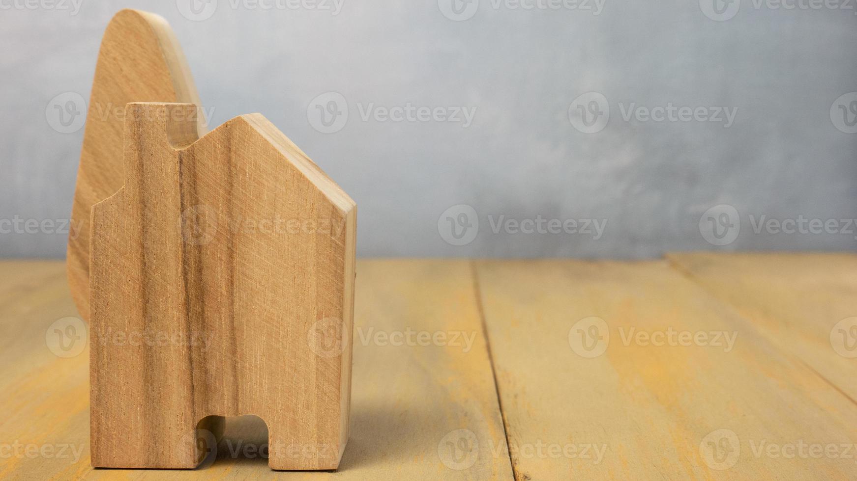 de hout huis voor gebouw of eigendom concept foto