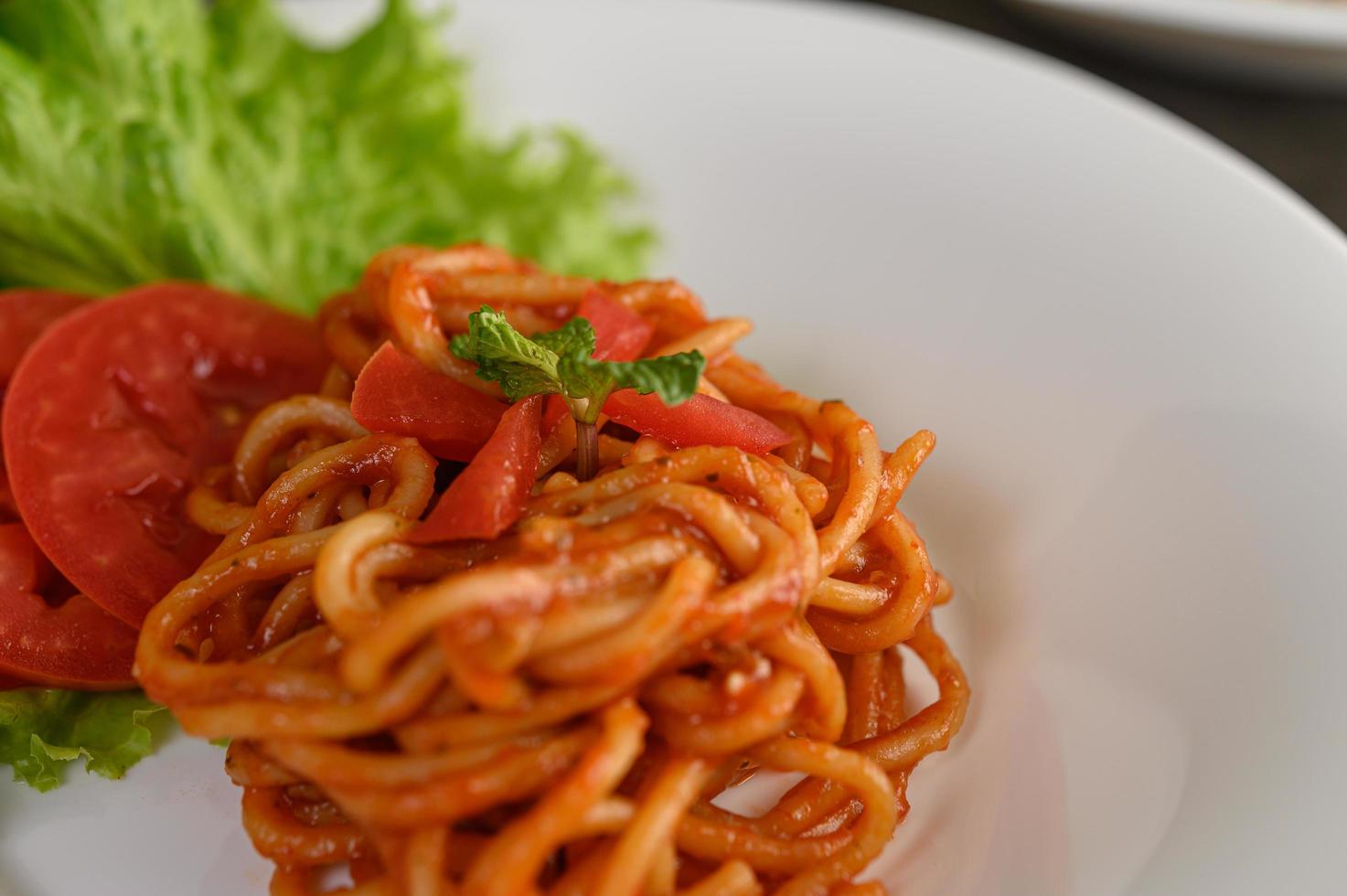 Italiaanse pasta met saus foto