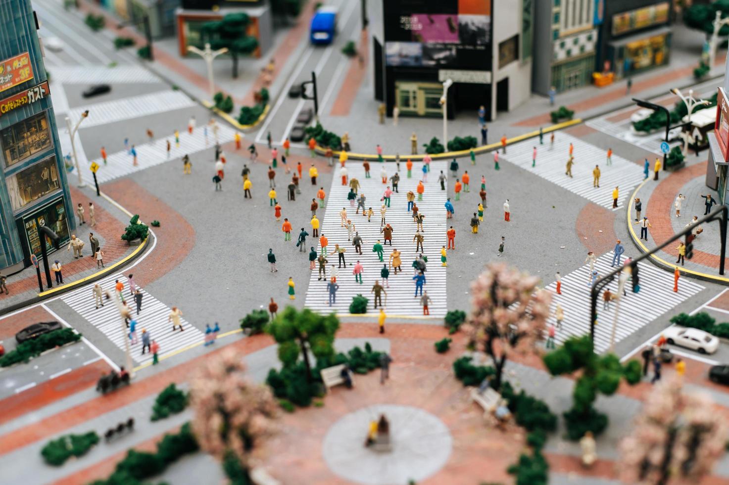 kleine tilt shift mensen in de stad foto