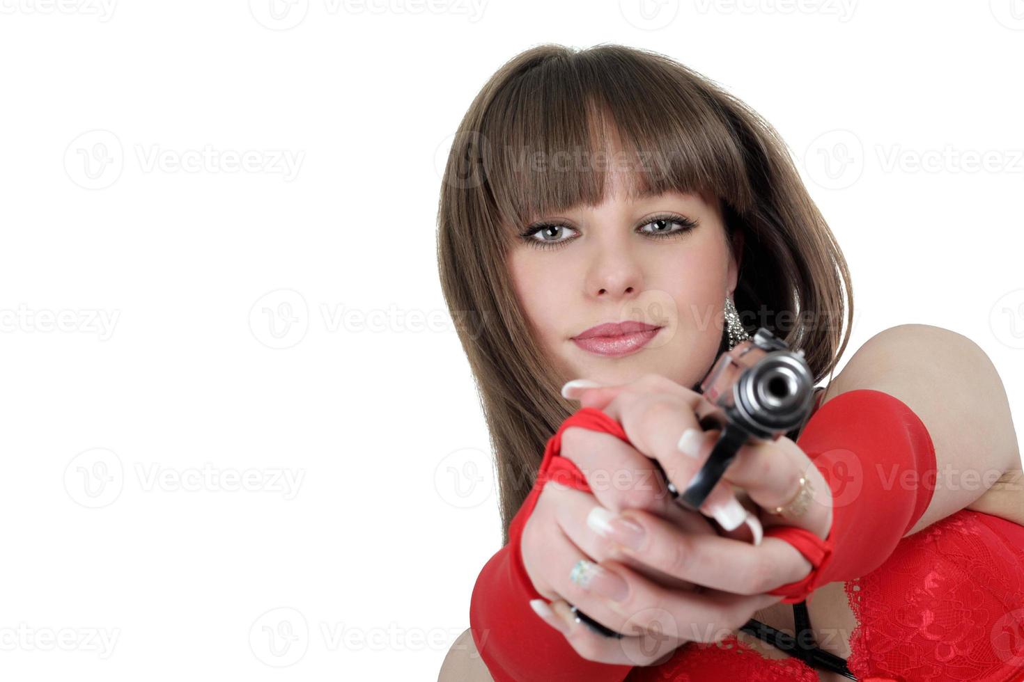 portret van de jong vrouw met een pistool foto