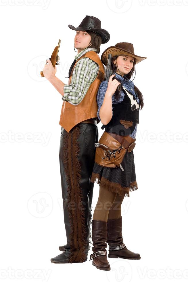 cowboy en veedrijfster met een geweren foto