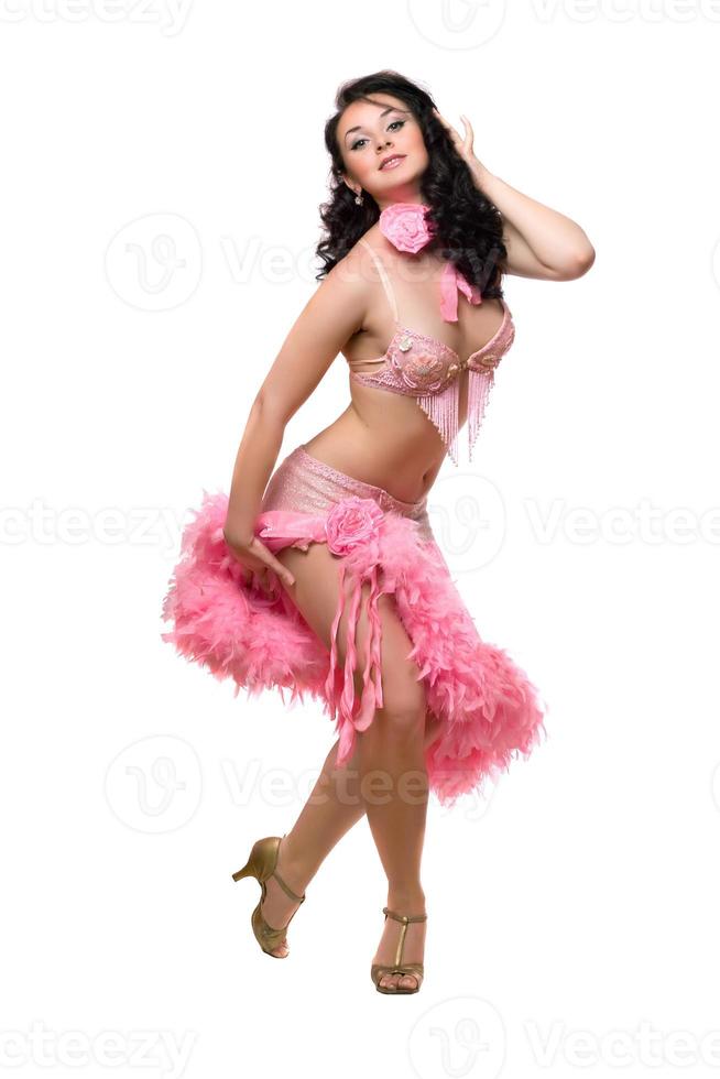 lief brunette in roze dansen jurk. geïsoleerd foto