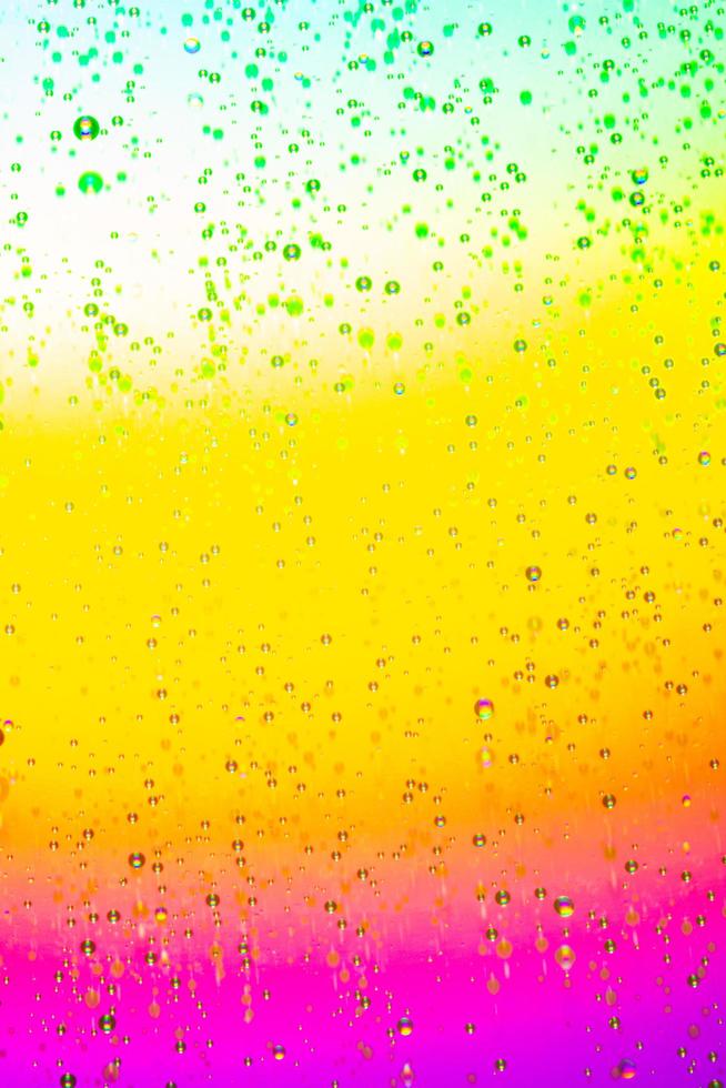 kleurrijk verloop met waterdruppeltjes foto