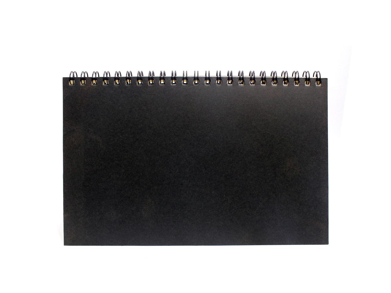zwart spiraalvormig notitieboekje foto