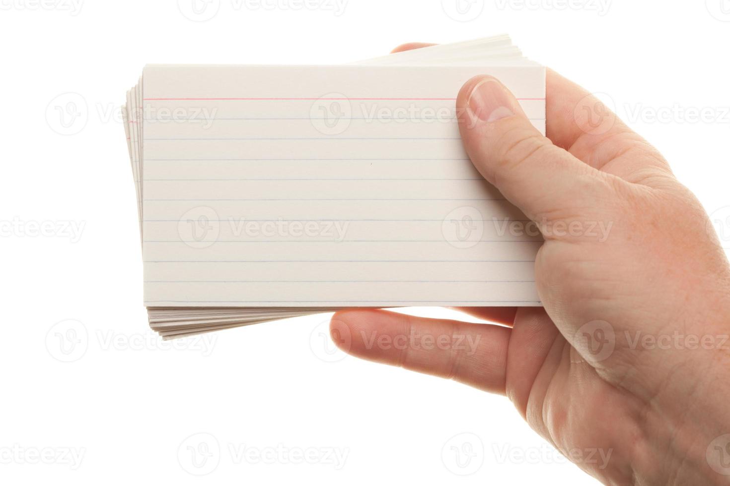 mannetje hand- Holding stack van flash kaarten foto