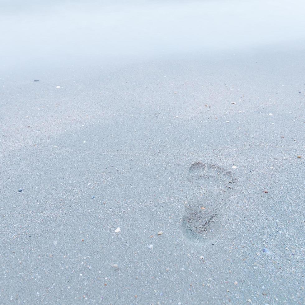 voetafdruk op het strand foto