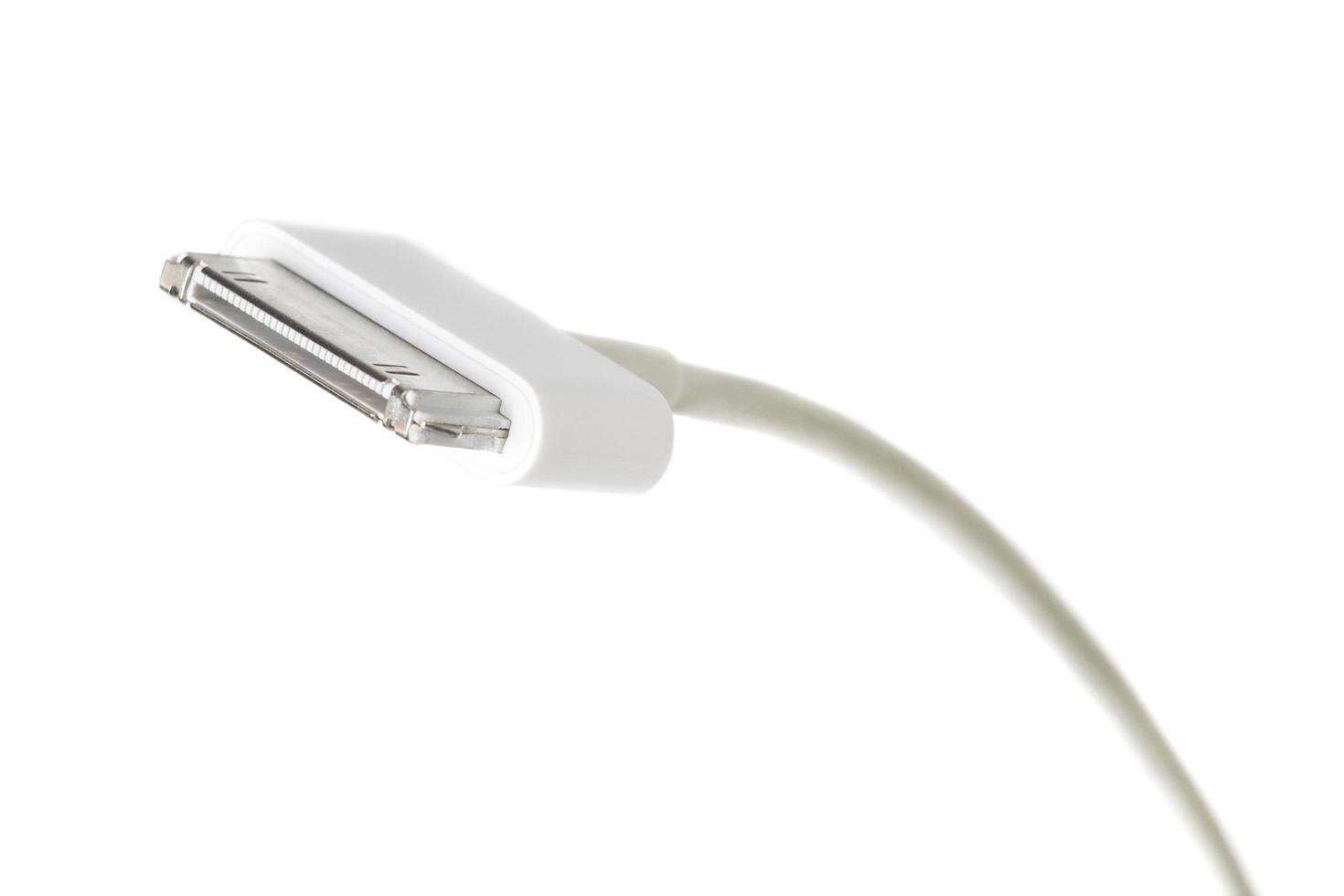 30-pins witte kabel voor het opladen van smartphone foto
