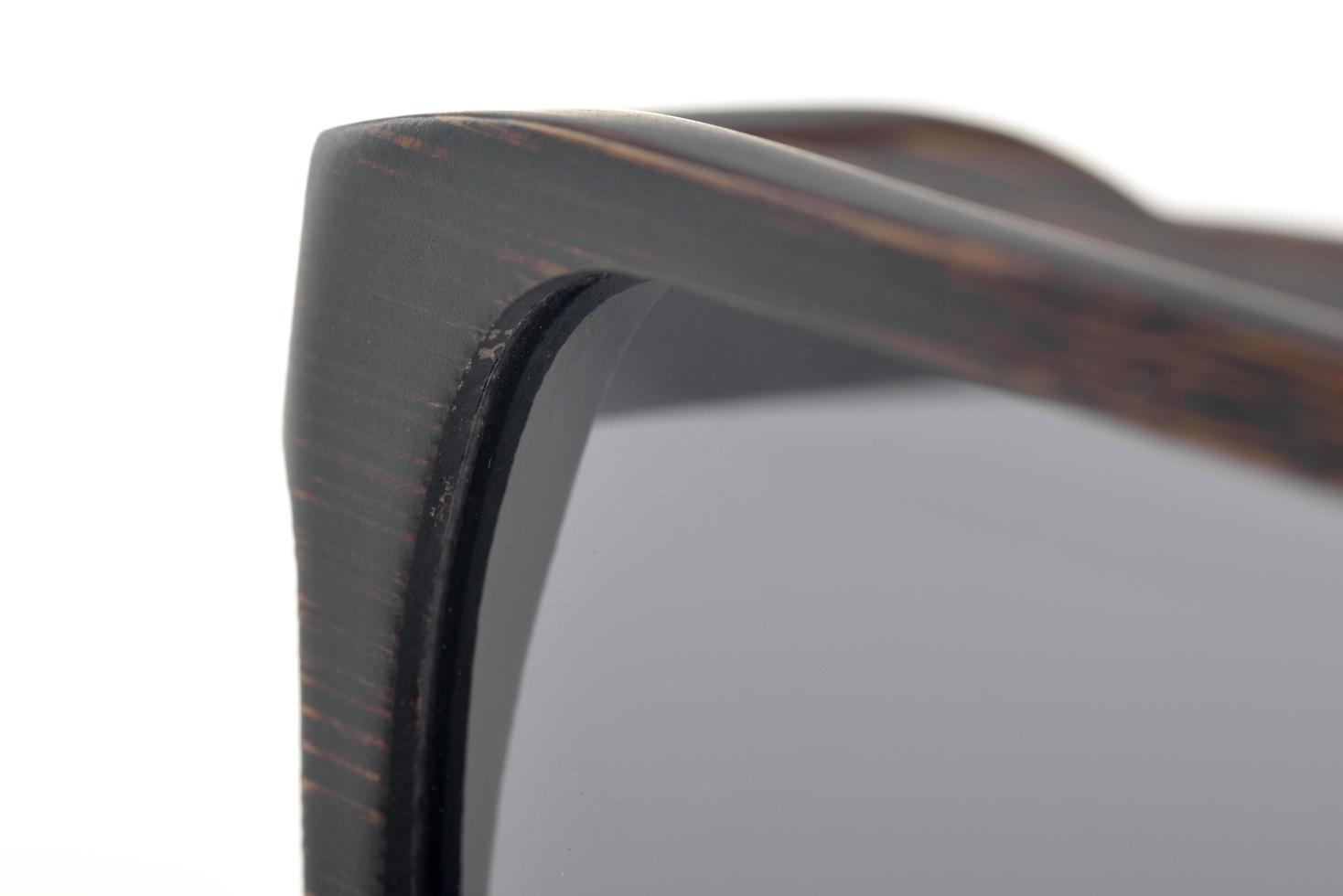 close-up van donkere houten zonnebril foto