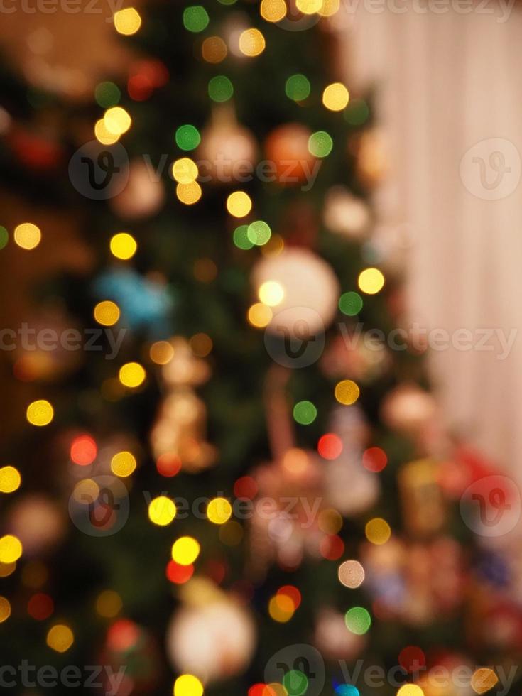 Kerstmis boom lichten vervagen achtergrond foto
