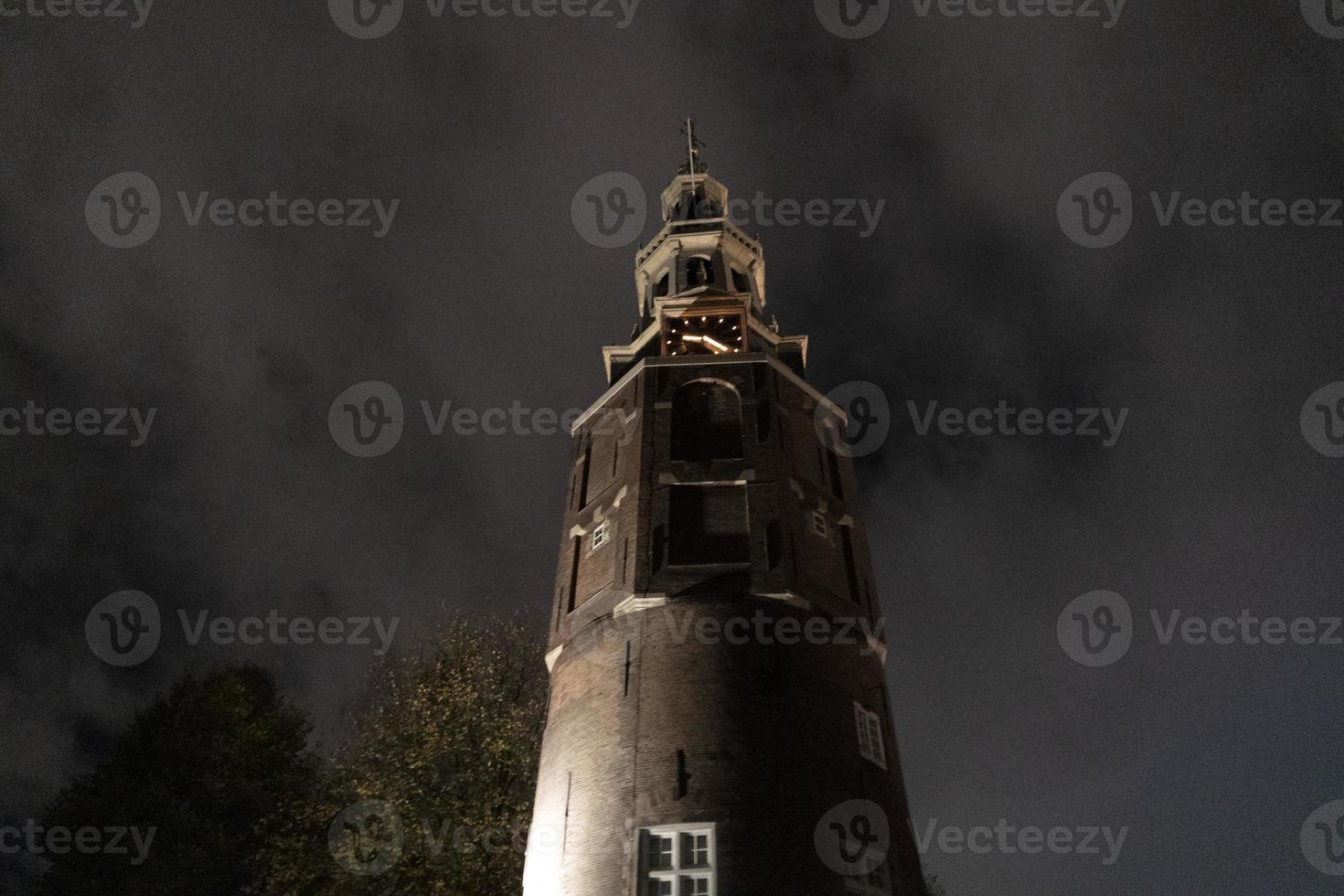 Amsterdam grachten reis Bij nacht foto